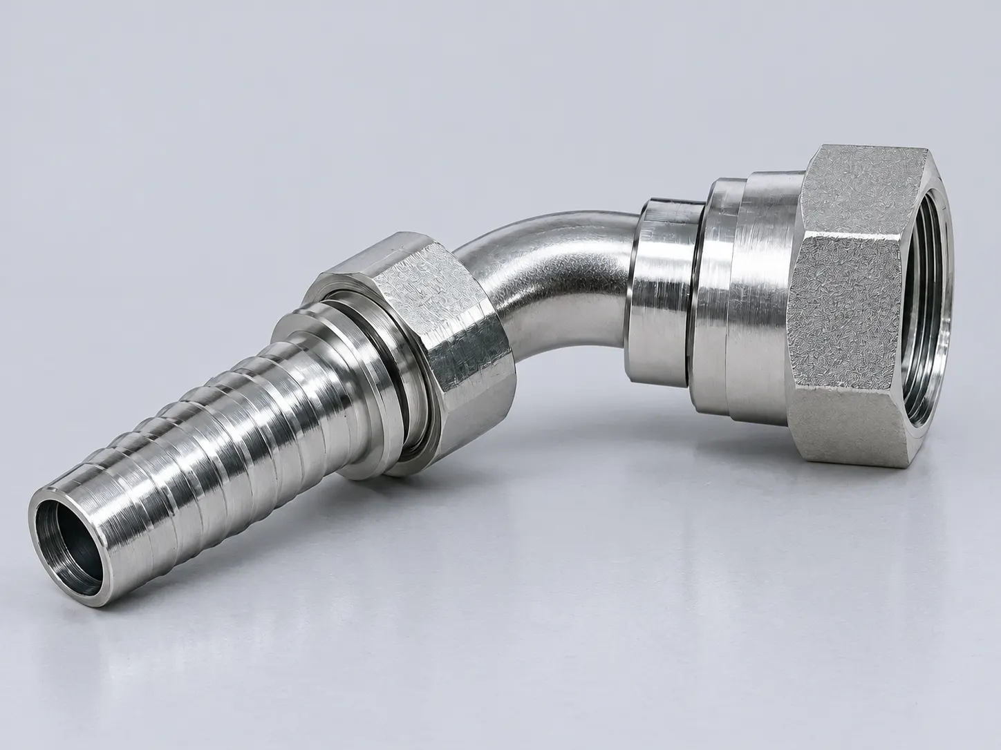 Hydraulic elbow fitting